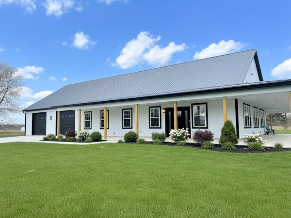Two-story barndominium floor plan with vaulted ceilings by Sayre Builders